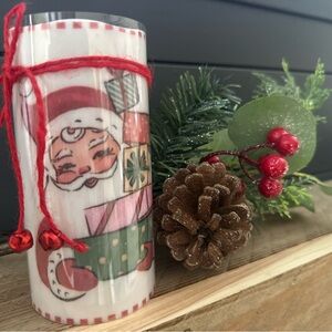 Festive LED Santa Holiday Candle with Red Accents